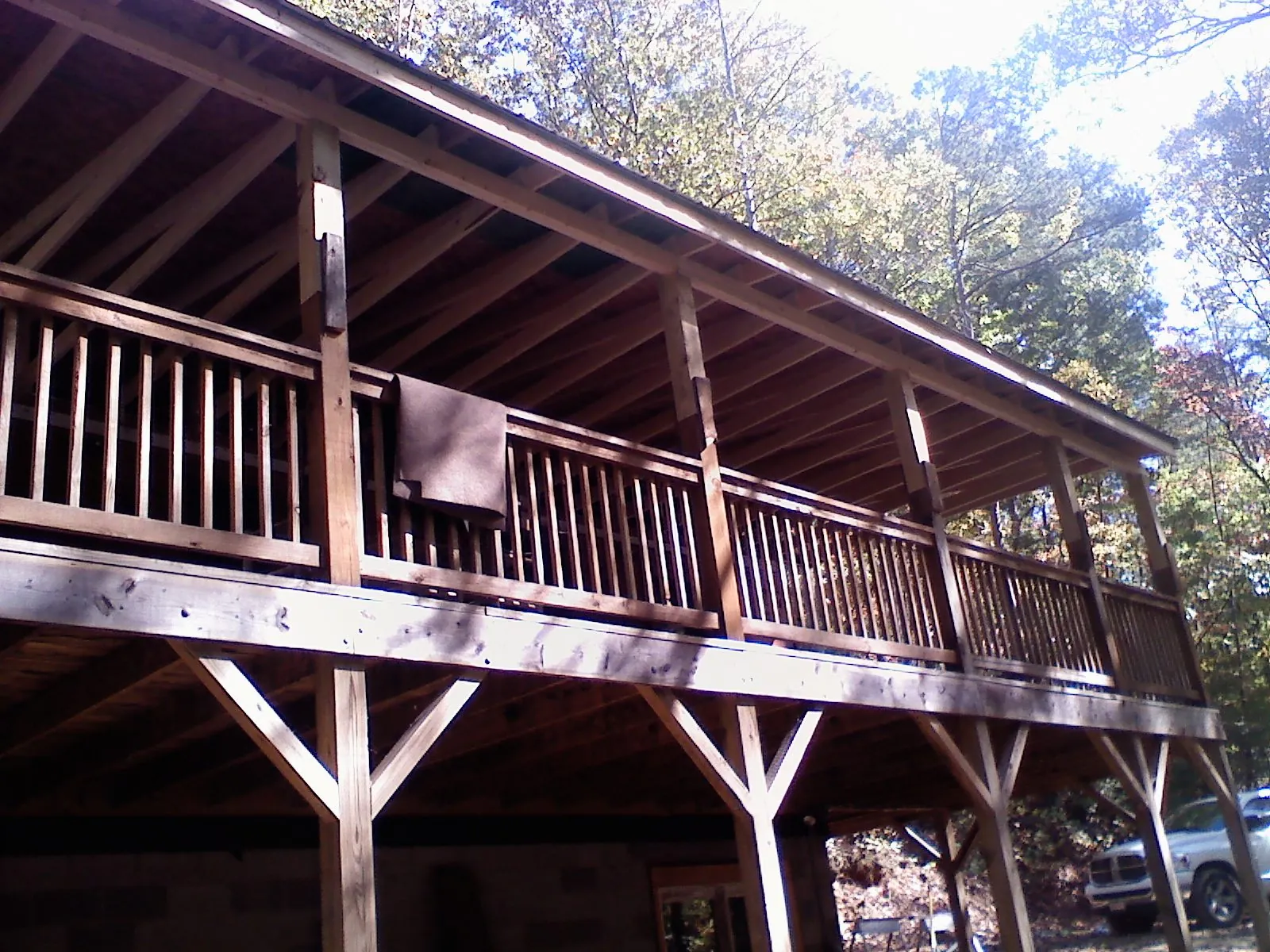 Timber framing under a new elevated porch and deck — Roof Leak Repair in Pray by Roofing Brothers